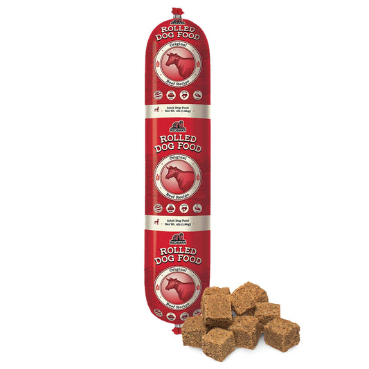 Red package of rolled dog food with a few pieces displayed on a white background
